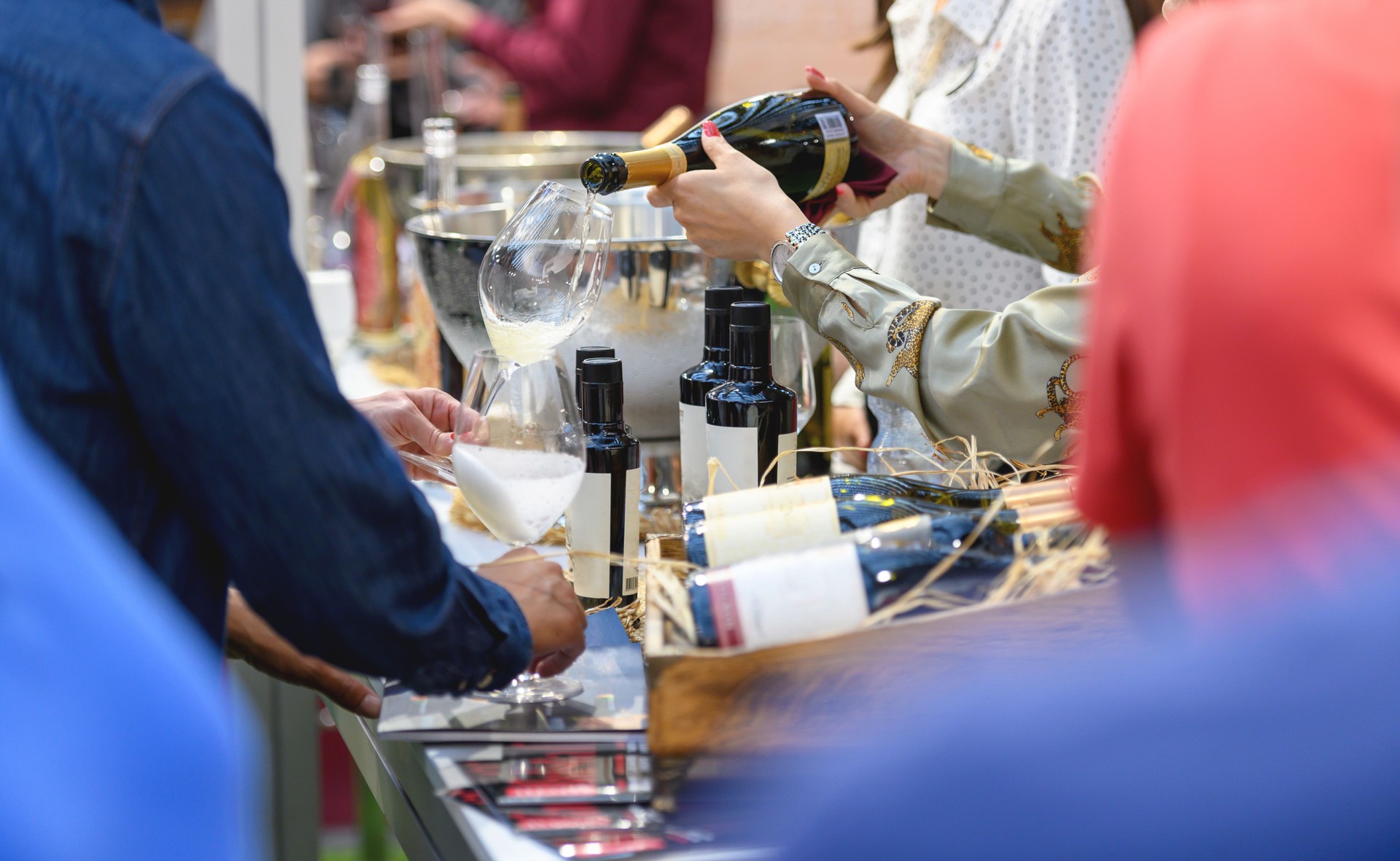 Pouring white wine for tasting